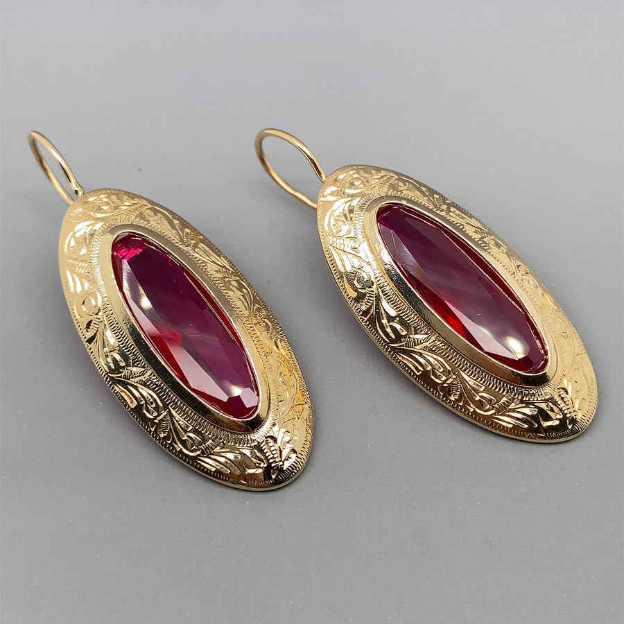 Oxidized Gold-Plated Red Stone Studded Floral Patterned Jhumka Earring –  Priyaasi